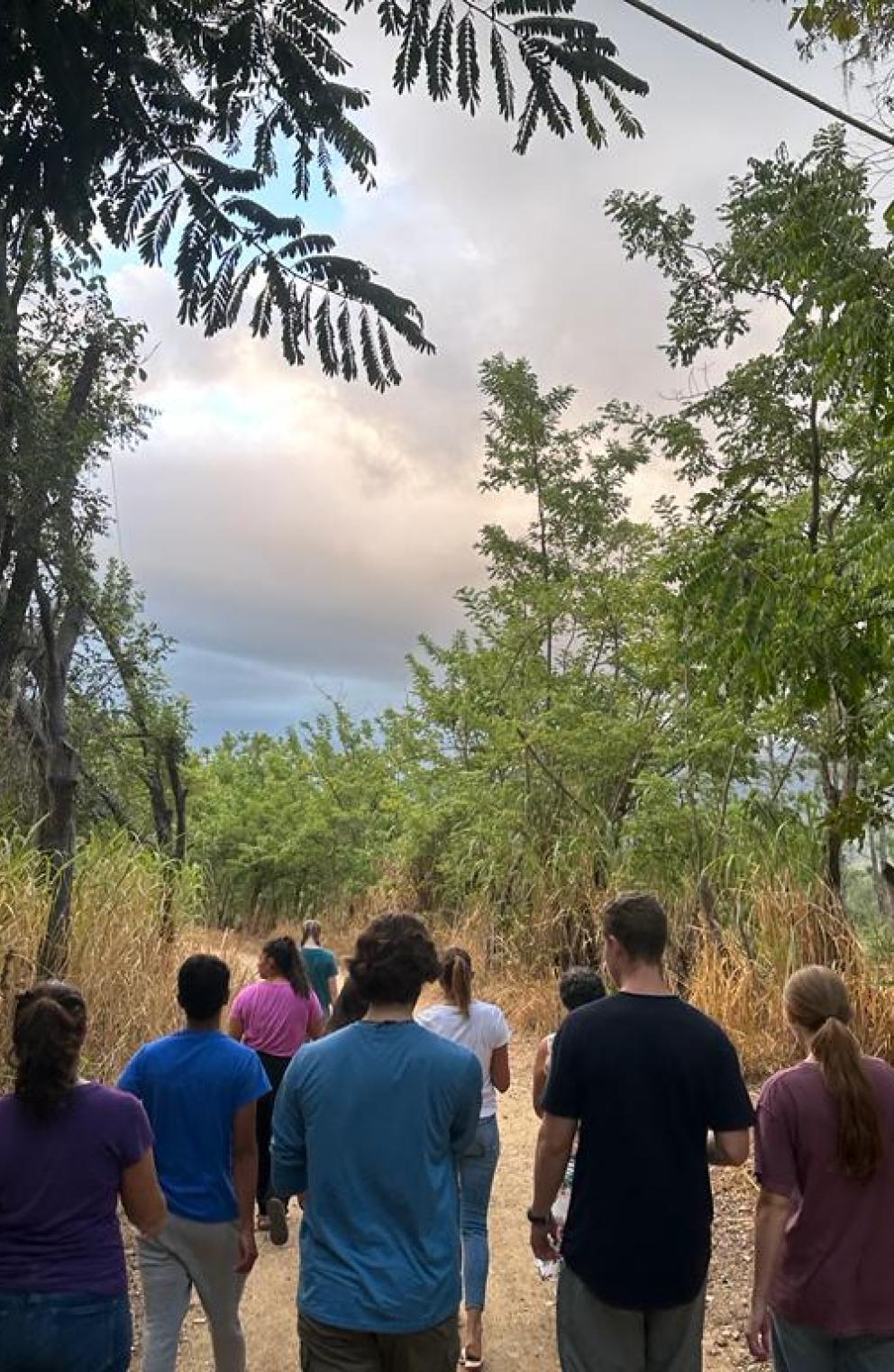 group walking down a road