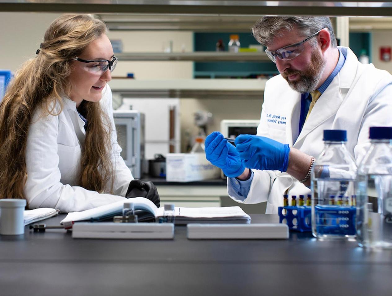 Dr. E. Jeffrey North in lab with SPAHP student